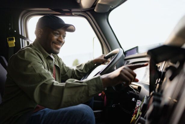 A truck driver prepares to pay for fuel at a Speedway gas station.