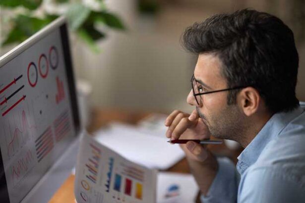 A business owner reviews data about the fuel card usage from his fleet of drivers and vehicles.