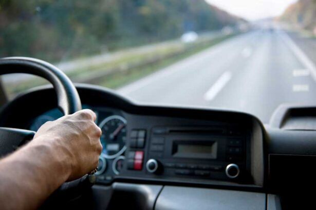 View of the odometer on the dashboard of a fleet truck driver’s semi.